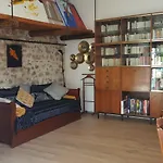 Little House With A Large Roof Garden In The City Center